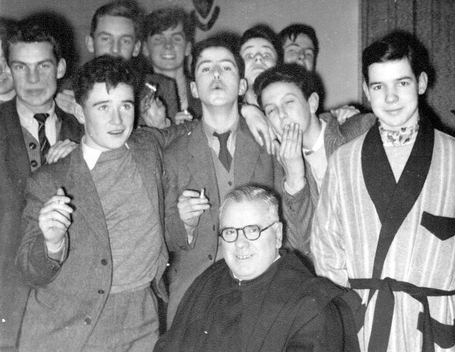 Farringdon 'Smoke' with Housemaster Dunstan. Percy, Moriarty, Freeman, D'Arcy, Keating, Allanson,Butler, ???, Booth.